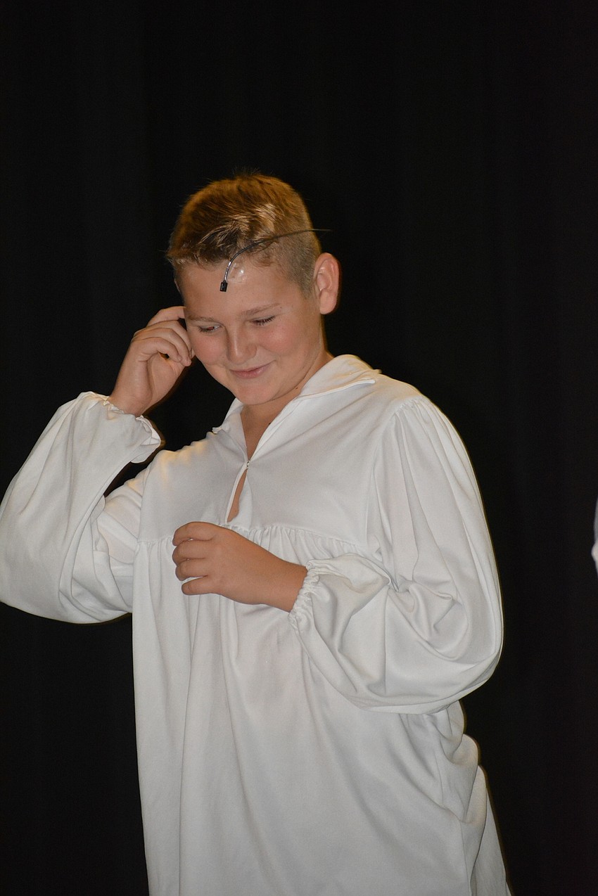 Corbin Hyson gets a mic check before the show.