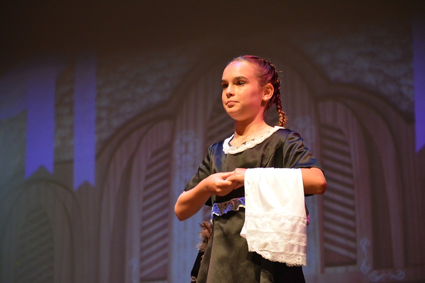 Callie Higgins as the handmaid.