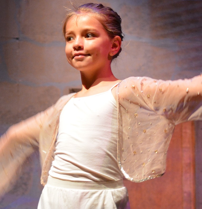 Natalie Blanco sings as part of the snow chorus.