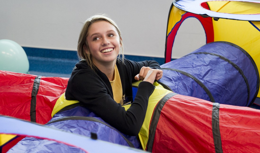 Victoria Laman, who will be a junior at River Ridge High School in New Port Richey, makes her way through the model of a lung.