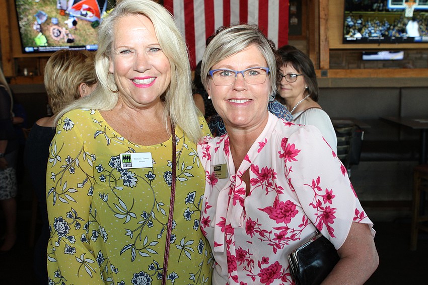 Becca Towery and Kimie Davis meet up early at the event.