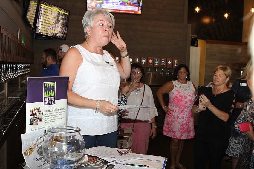 Grant Chair Terri Stern gets the group cheering.