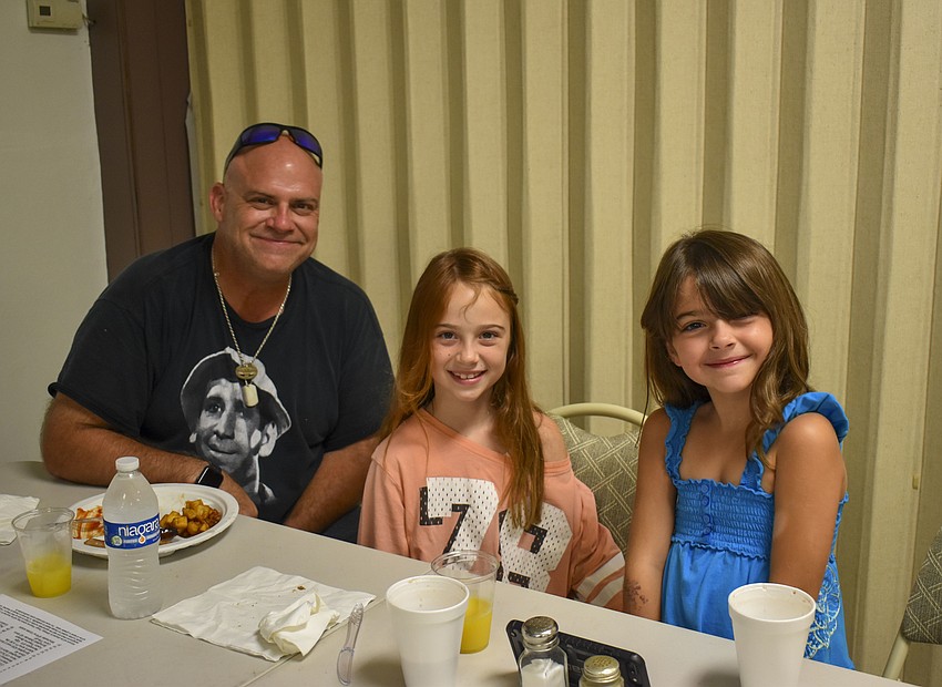 Ian Harrington with his daughters Cyleigh and Isabella.