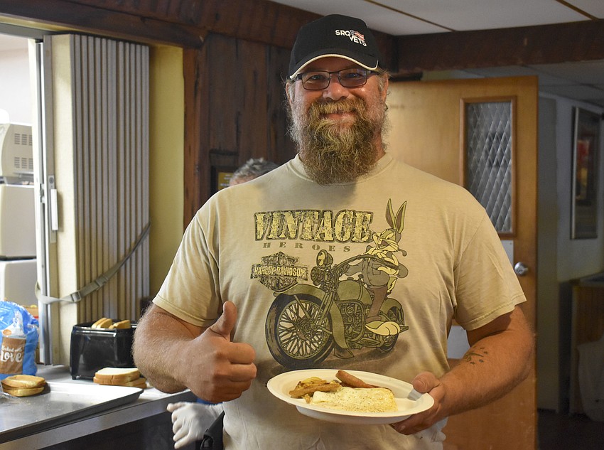 Joe Golembeski‎ shows off his breakfast.