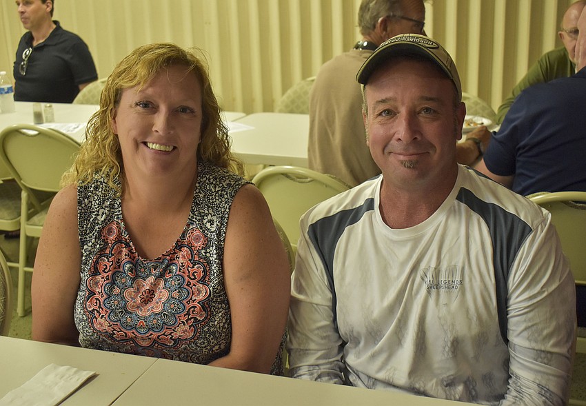 Lana Wilson and Kevin Turner wait for their food to be delivered.