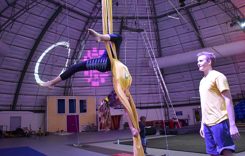 Khloe Brooks strikes a pose while practicing aerial silks.