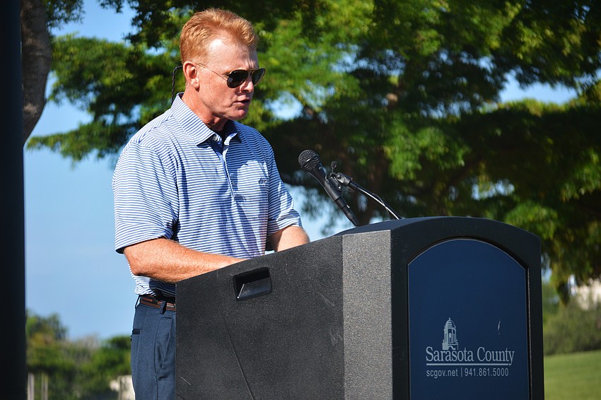 Commission Chair Charles Hines spoke to attendees prio to revealing the official bond