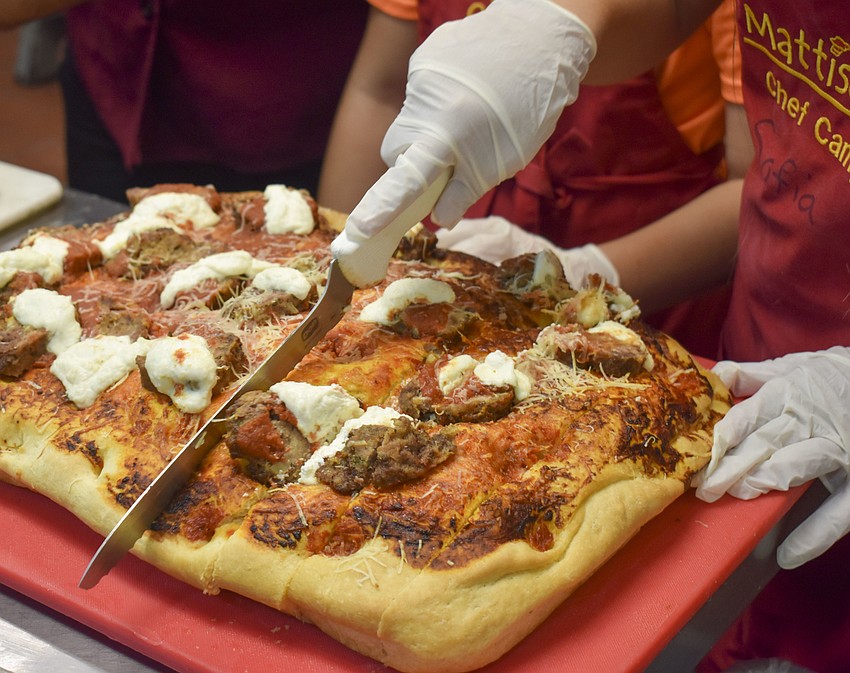 Spaghetti focaccia bread is one of the three breads to be made by the little chefs.