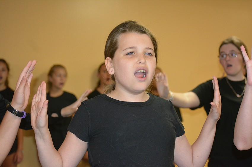 Alanna Bray performs with the group during 