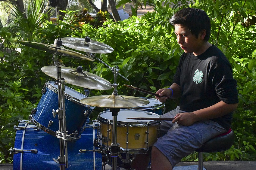 Jacob Rothenbach plays drums during The White Strips' 