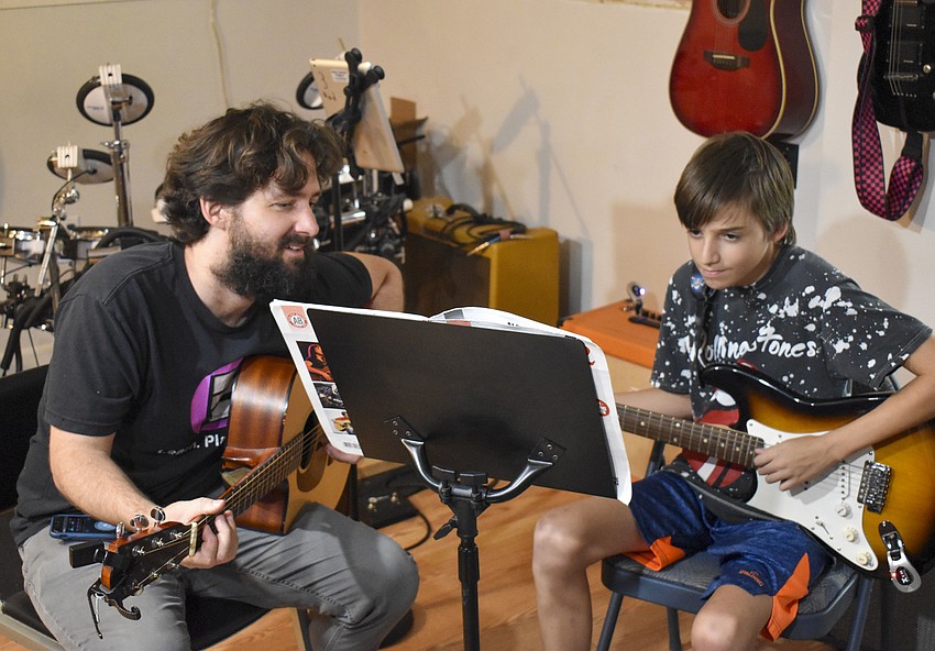 Gene Hodsdon coached Logan Warren through his private lesson.