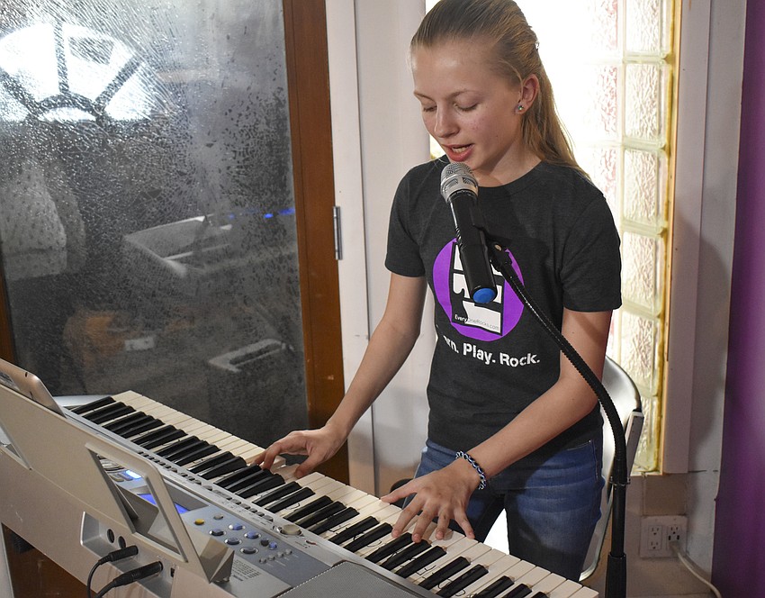 Nadya Smirnova plays keys and sings Queen's 