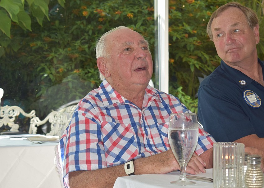Incoming president Nancy Rozance's father, Jerry Hubsmith, watched his daughter as Jack Rozance looked on.