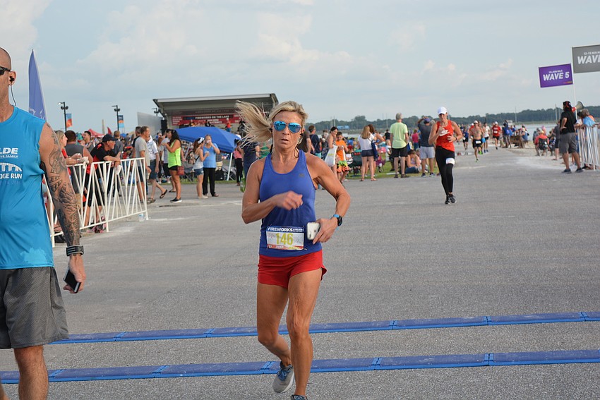 Bradenton's Cordie Hentges completes the Fireworks 4-Miler On The Lake in 33:02.