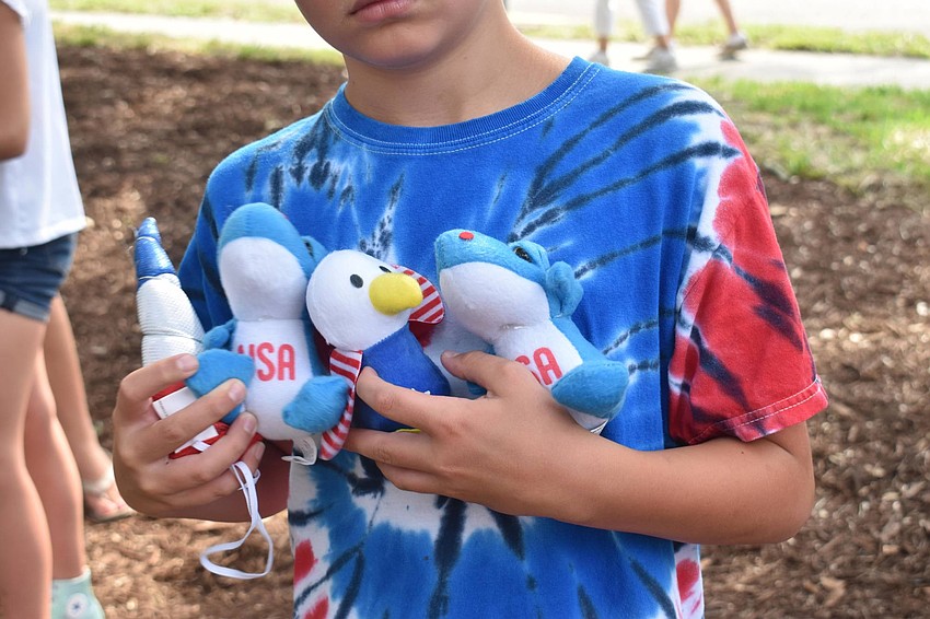 Miles Novreske cleaned up at the games and displays his prizes.