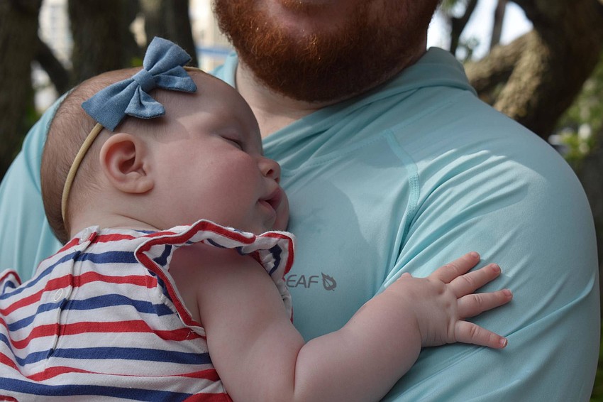 One of the youngest participants at the Freedom Fest at four months old, Eleanor Clark, takes a mid-morning nap.