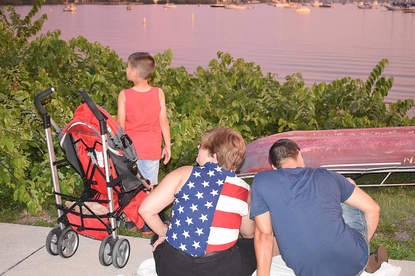 Ivan Valencia, Torry McKeehan and Phil Swier waited for the show to begin at Bayfront Park.