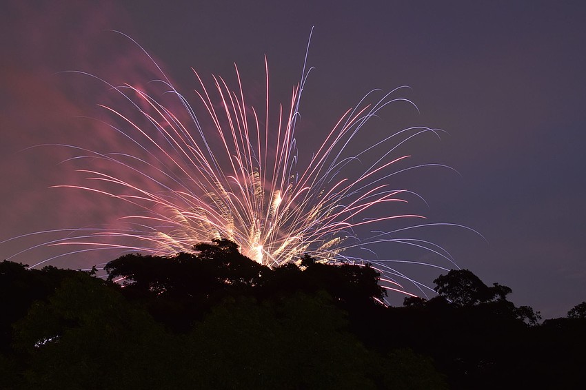 Fireworks over Sarasota Bay delighted revelers.