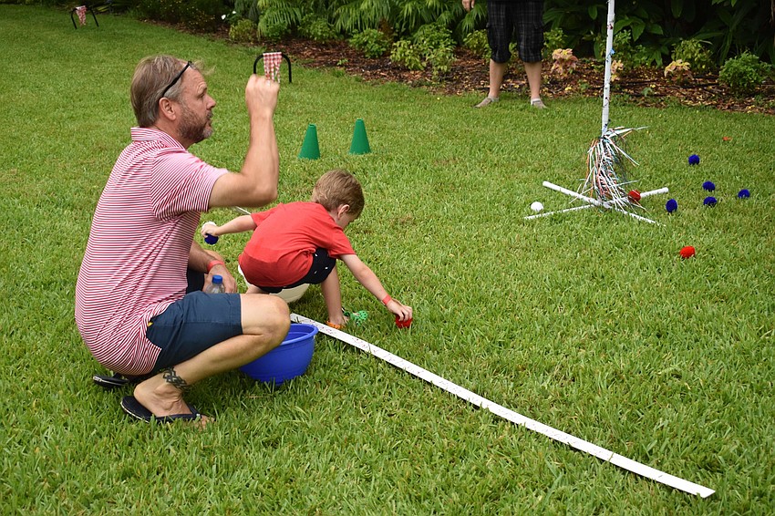Shawn and Jacob Stuart partake in the games at the gardens.