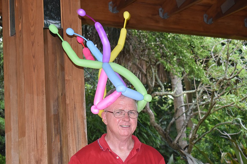 Greg Art's hat bobbed in the breeze.