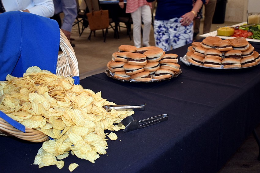 Guests could dress up a hamburger and munch on potato chips.