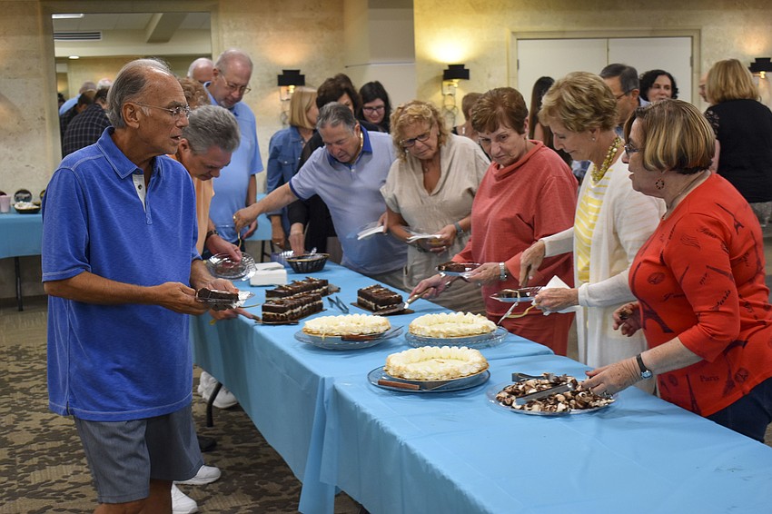 During halftime trivia players indulge in desserts.