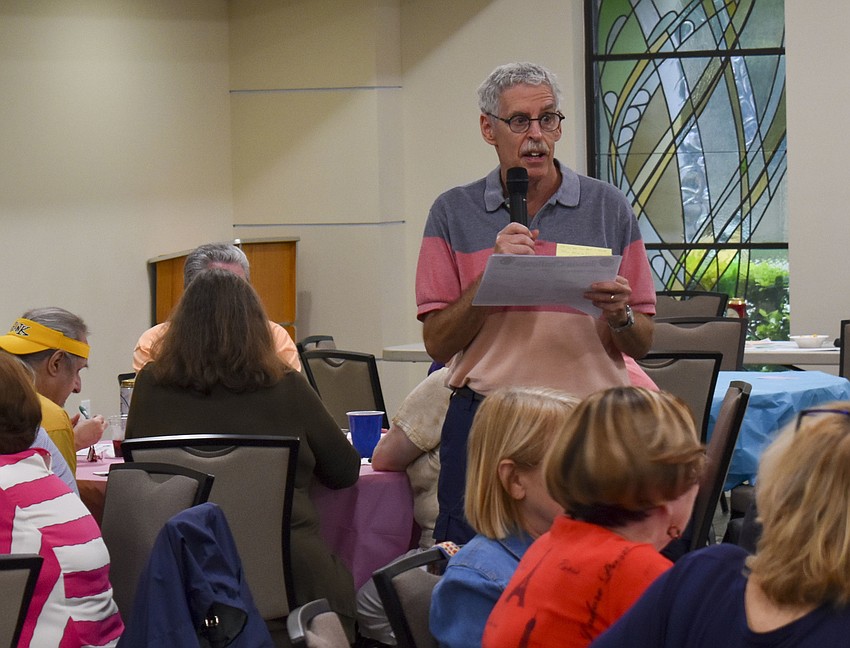 Bob Meisel, president of the Brotherhood, goes over the rules of the game.