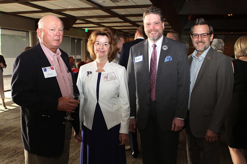 Stan Valerga, Alliance Francaise de Sarasota President Carole Crosby, Scott Guinn and Jonathan Courtemanche