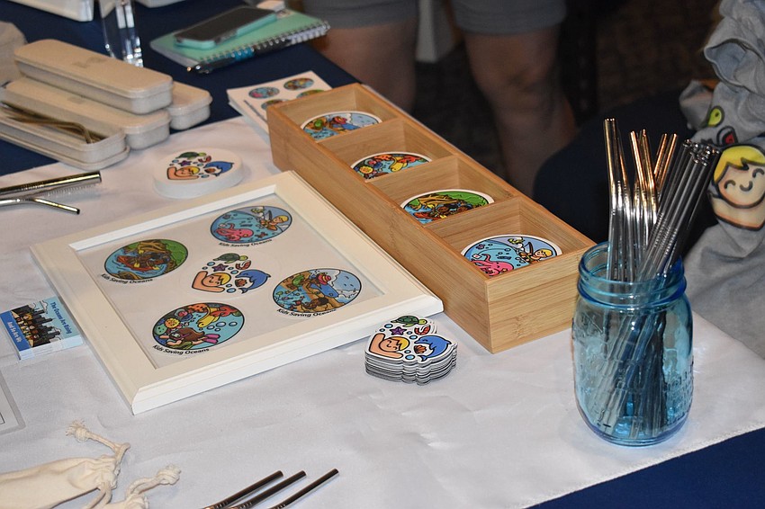 Besides food, tables like 7-year-old Miles Fetherston-Resch's business, Kids Saving Oceans, were present at the tasting event. Kids Saving Oceans creates products like the stickers out of ocean plastic.