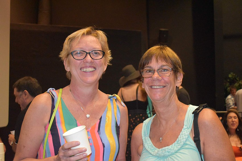 Cindy Polzer and Kathy Grant, the latter of whom came from Tampa for the event, pose together.