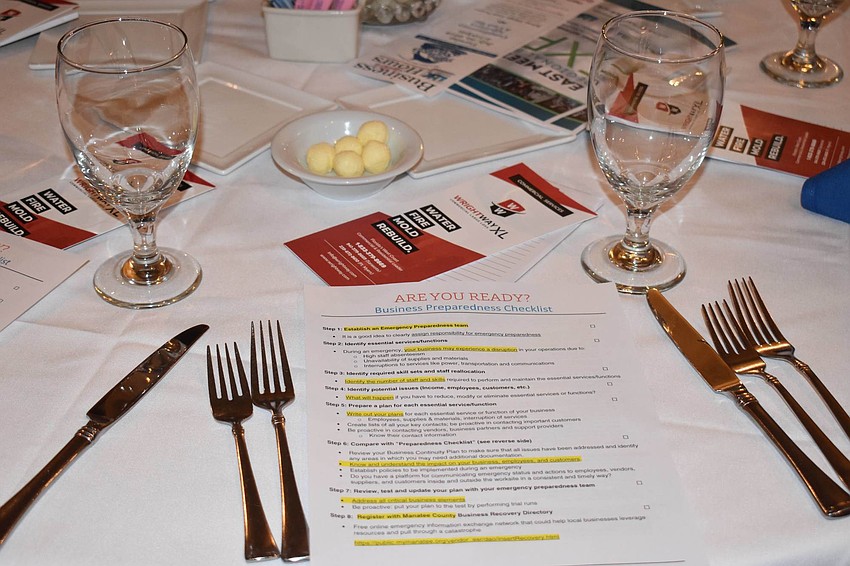 In lieu of a menu since guests had already placed their orders, a sheet of disaster preparedness tips lay on the table.
