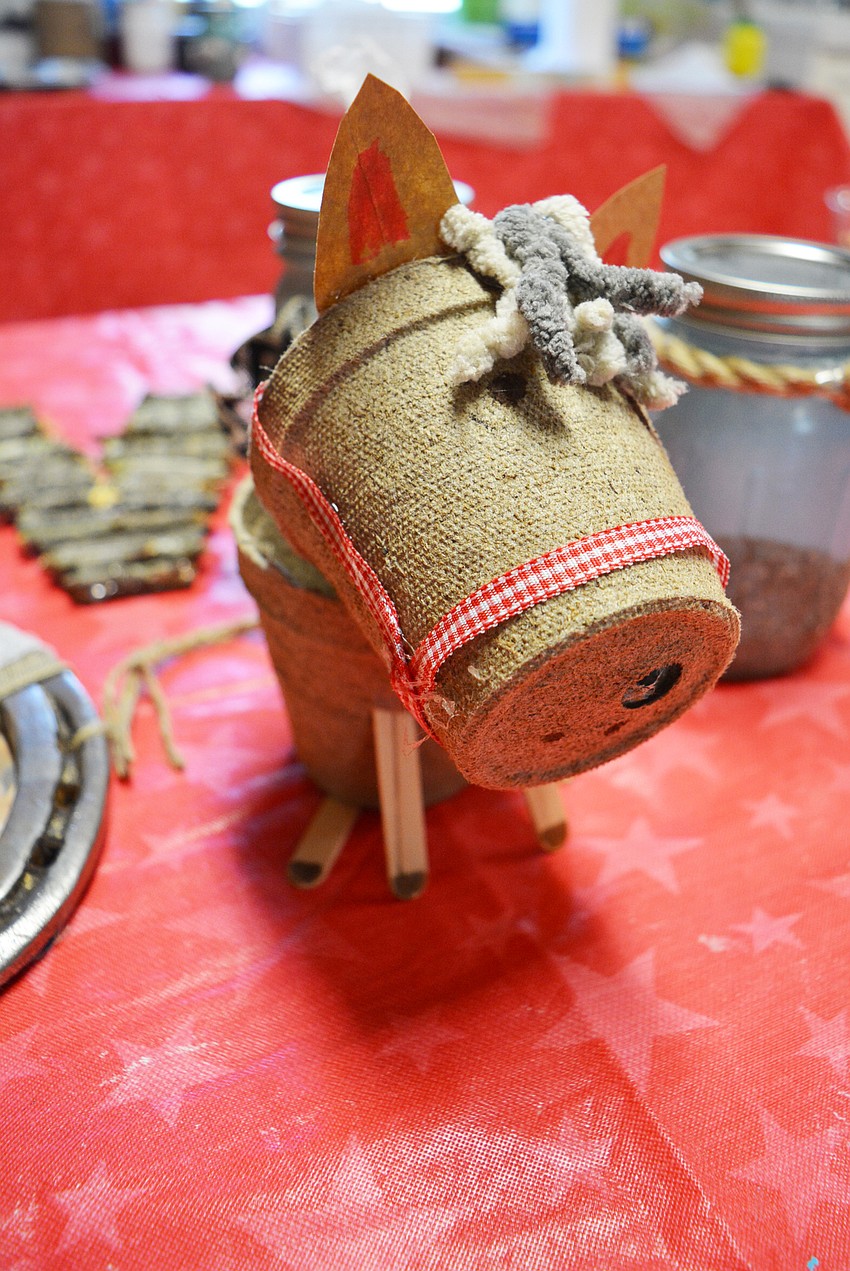 Campers make a new craft, such as this horse made of biodegradable pots, each day.