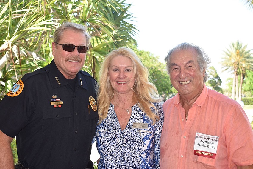Police chief Pete Cumming, assistant to the town manager Susan Phillips and Republican Club president Joe McElmeel at the event.