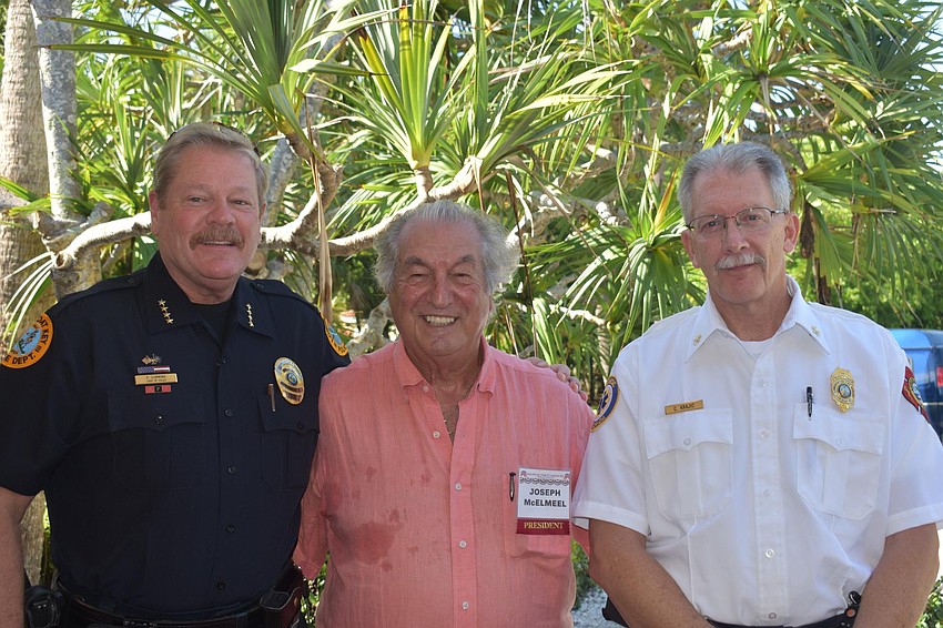 Pete Cumming, Joe McElmeel and fire rescue deputy chief Chris Krajic at the event.