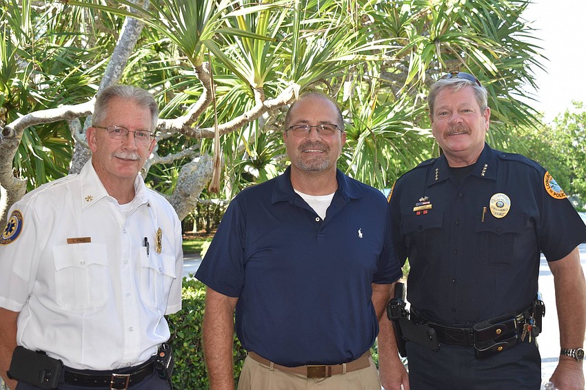 Chris Krajic, town manager Tom Harmer and Pete Cumming.