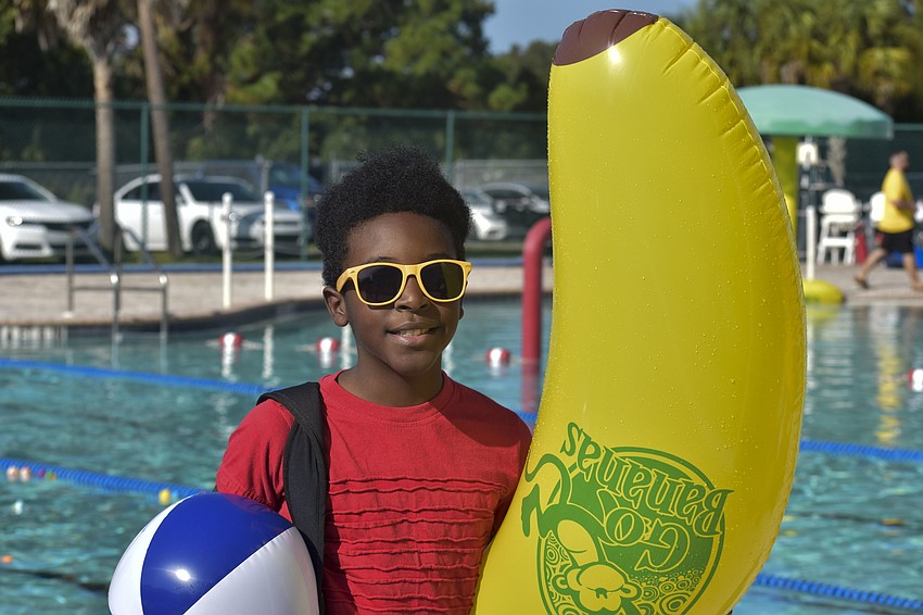 Joseph Baldwin shows off his banana float from Intertape Polymer Group.