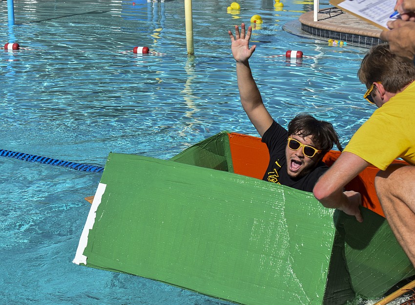 Kyle Smith celebrates his teams win in the teens group.