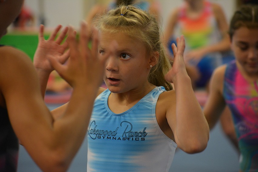 Zoey Morelli practices a body movement drill.