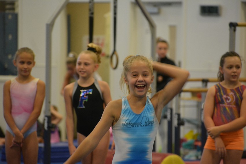 Kenzie Jakubauskas works at the body movement station.