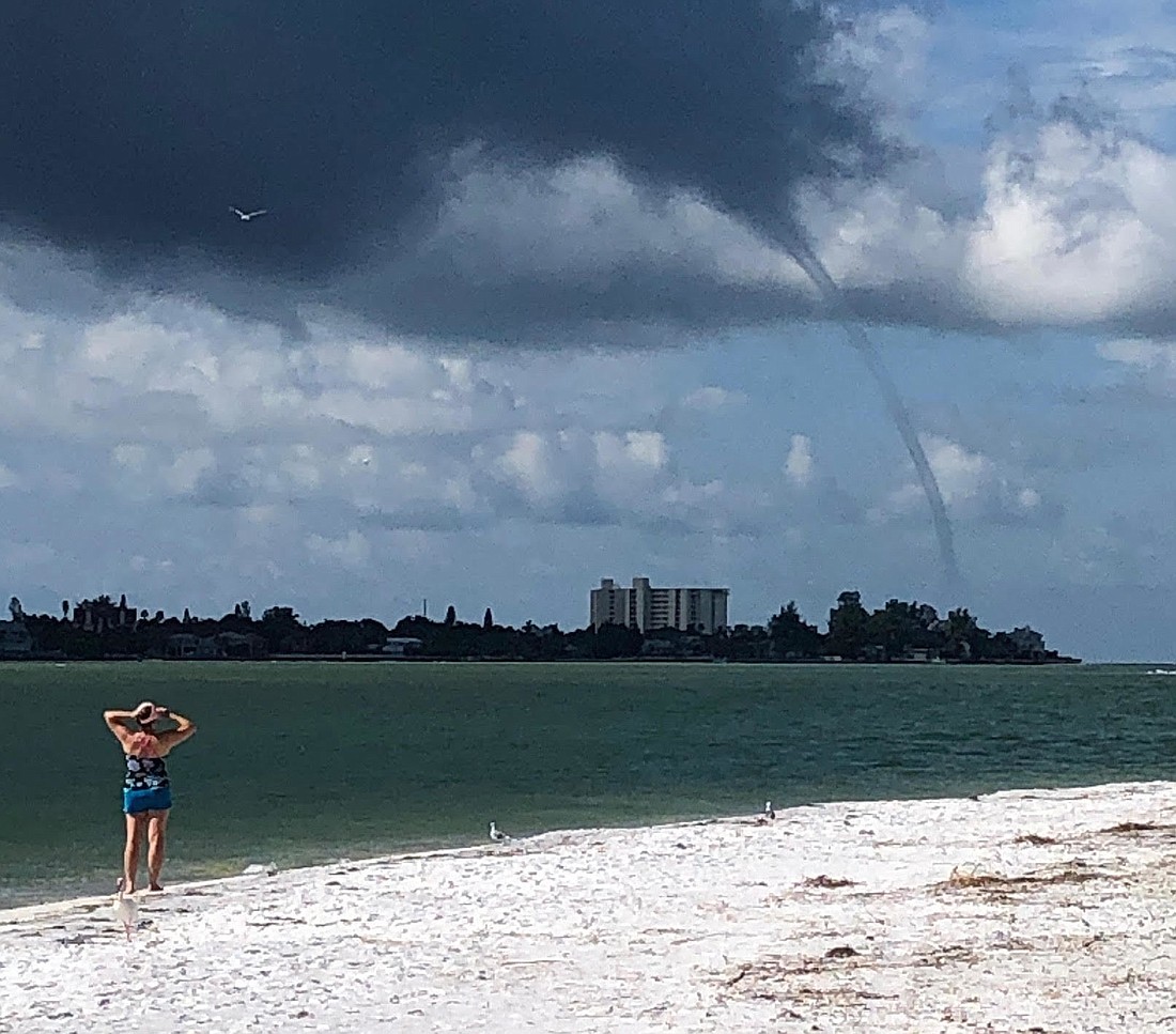 A beach visitor on South Lido Key photographed the waterspout off Siesta Key. (Courtesy image)