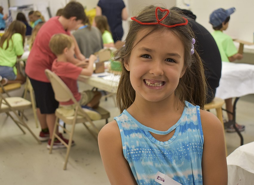Ellis Ackerman poses with her pipe cleaner tiara.