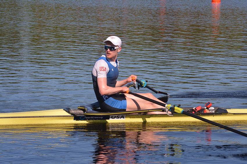 Samuel Melvin backs up to the dock after winning the lightweight men's single scull race (7:06.67) at the 2019 World Rowing U23 Championships.