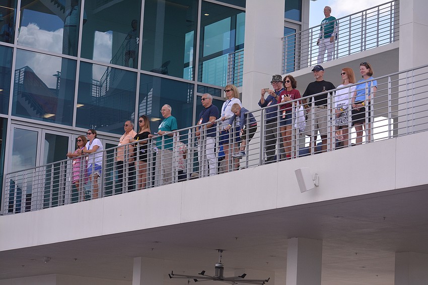 Some attendees watched the race from a second-level balcony at Nathan Benderson Park's finish tower.