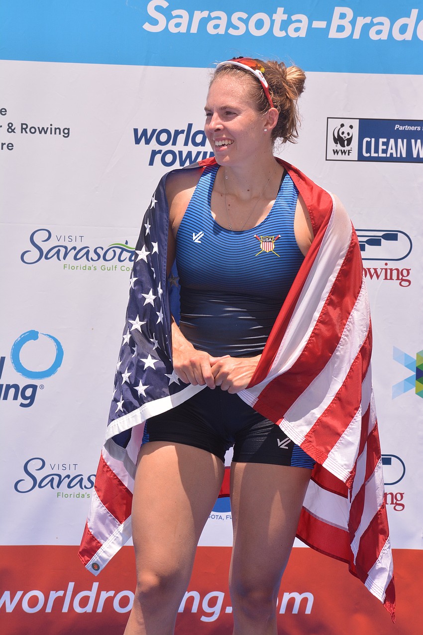 U.S. rower Emily Kallfelz smiles after taking silver in the women's single scull (7:37.61).
