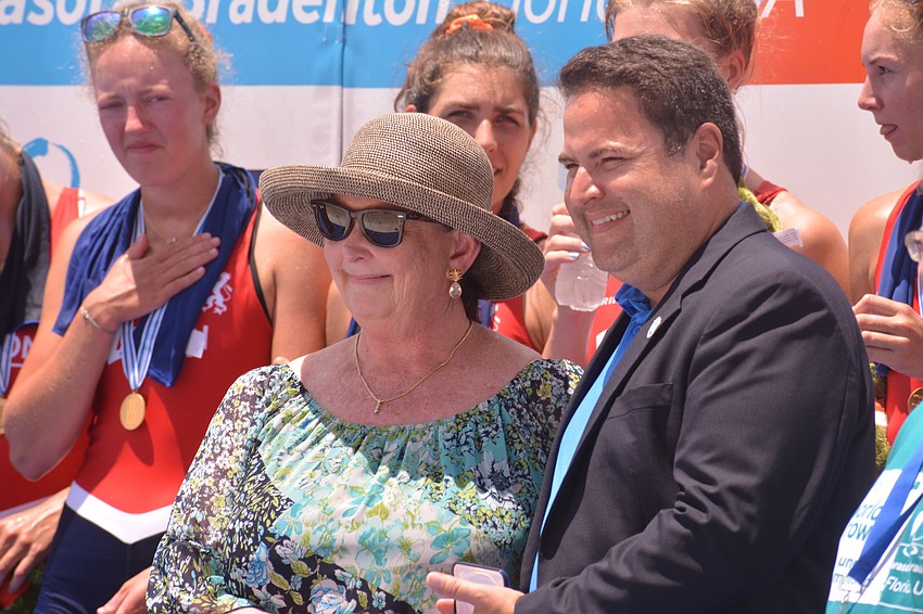 Visit Sarasota County president Virginia Haley and SANCA president Stephen Rodriguez were given medals of honor by FISA president Jean-Christophe Rolland at the closing ceremony.
