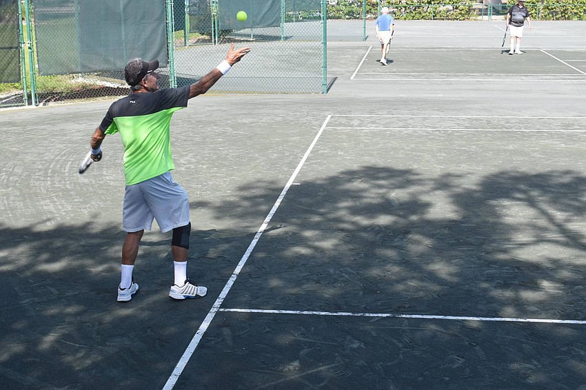 Enrique Vela serves up a good start to a point.