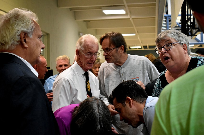 Members asked Interim CEO Steve Bourne and other board members questions following the meeting.