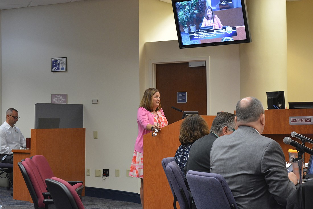 Darenda Marvin, the planner representing Schroeder-Manatee Ranch for the proposal, explains changes to commissioners.