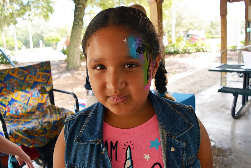 Mallory Park 8-year-old Satiana Sabrosa wanted all the colors of the rainbow behind her unicorn tatoo.