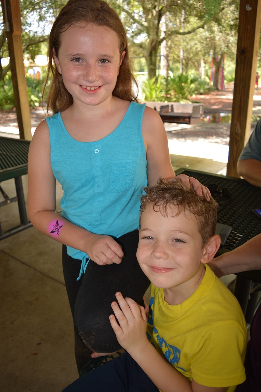Central Park 9-year-old Ashlyn Withers, with her 6-year-old brother Brody, says she loves to read because of the adventure.